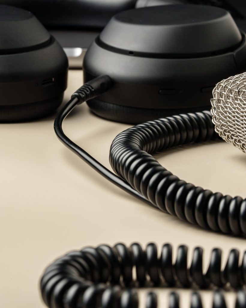 Headphones and microphone on the table close up photo